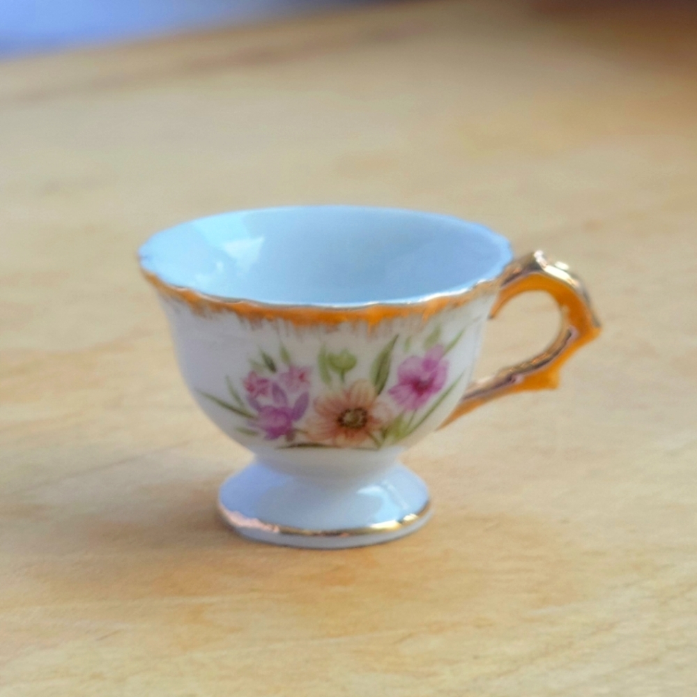 Vintage miniature porcelain tea cup